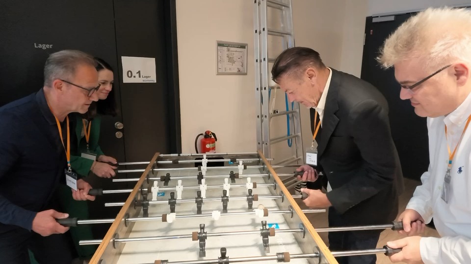 Visitors playing foosball at the founding event